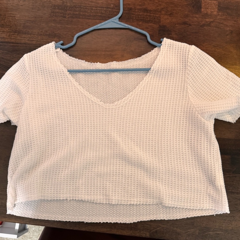 Off the shoulder, crop loose teeth